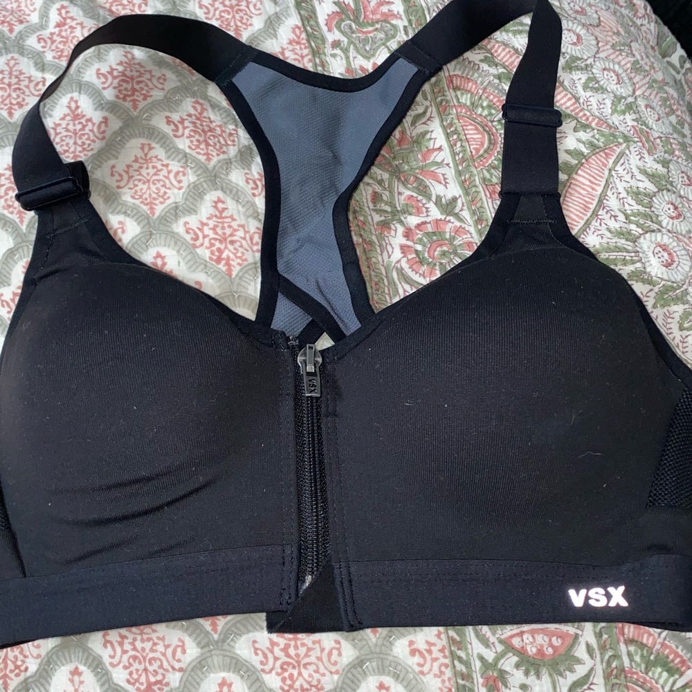 Victoria secret sports bar. Zip up cross back.